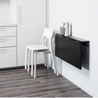 Кухонный стол Ikea Бьюрста (коричнево-чёрный) [803.588.30]