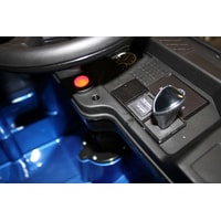 Электромобиль RiverToys Mercedes-Benz Actros 4WD HL358 с прицепом (синий)