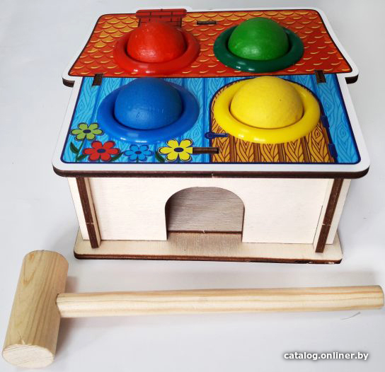 

Развивающая игрушка WoodLand Toys Стучалка цветная. Домик 115308